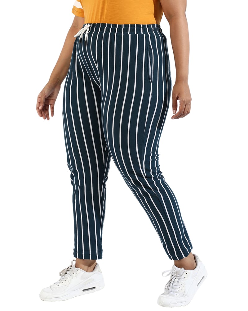 Front of a model wearing a size 6XL Women Blue Striped Active & Evening Trackpant in Navy by Instafab Plus. | dia_product_style_image_id:294264